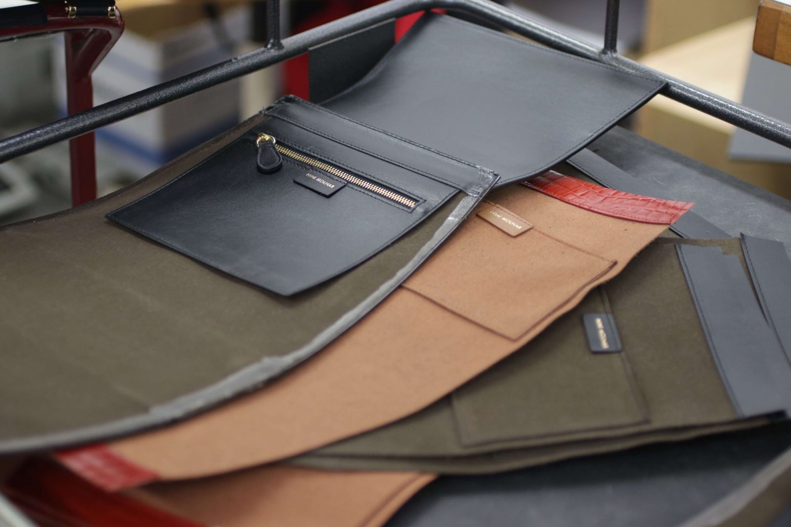 Cut leather panels with zip pockets